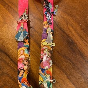 Disney lanyard and collector pins.